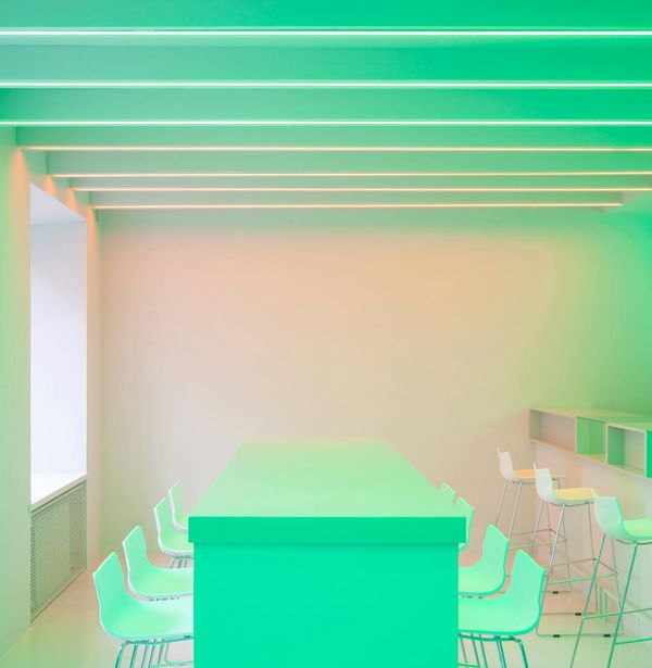 Clean minimalist interior with soft neon lighting